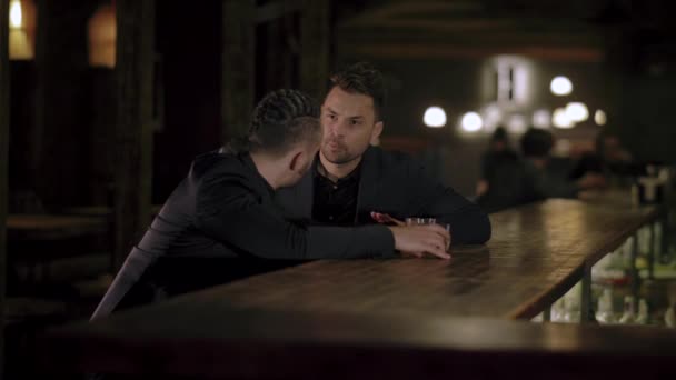 depositphotos_252948932-stock-video-two-men-in-suits-drink.jpg