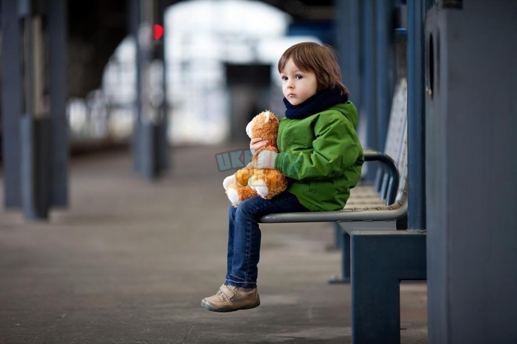 depositphotos_61565929-stock-photo-cute-boy-sitting-on-a.jpeg