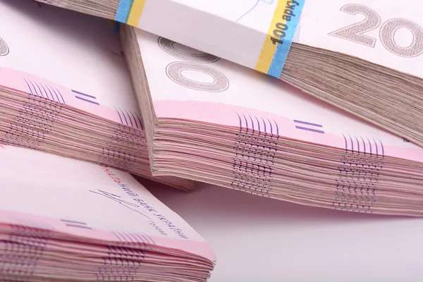 depositphotos_69764869-stock-photo-pile-of-ukrainian-money-ukrainian.jpg