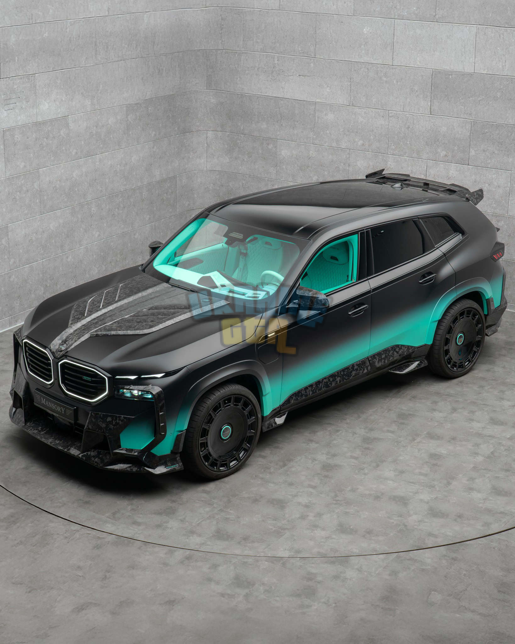 Mansory-XM-black-turquoise-7.jpg